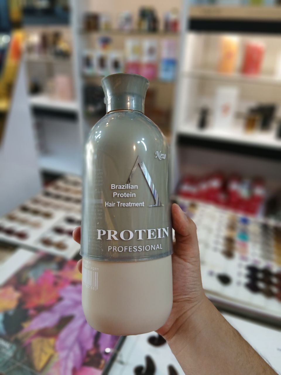 محصول پروتئین و درمان مو با عنوان Brazilian Protein Professional، مناسب استفاده در مراقبت و احیای مو.