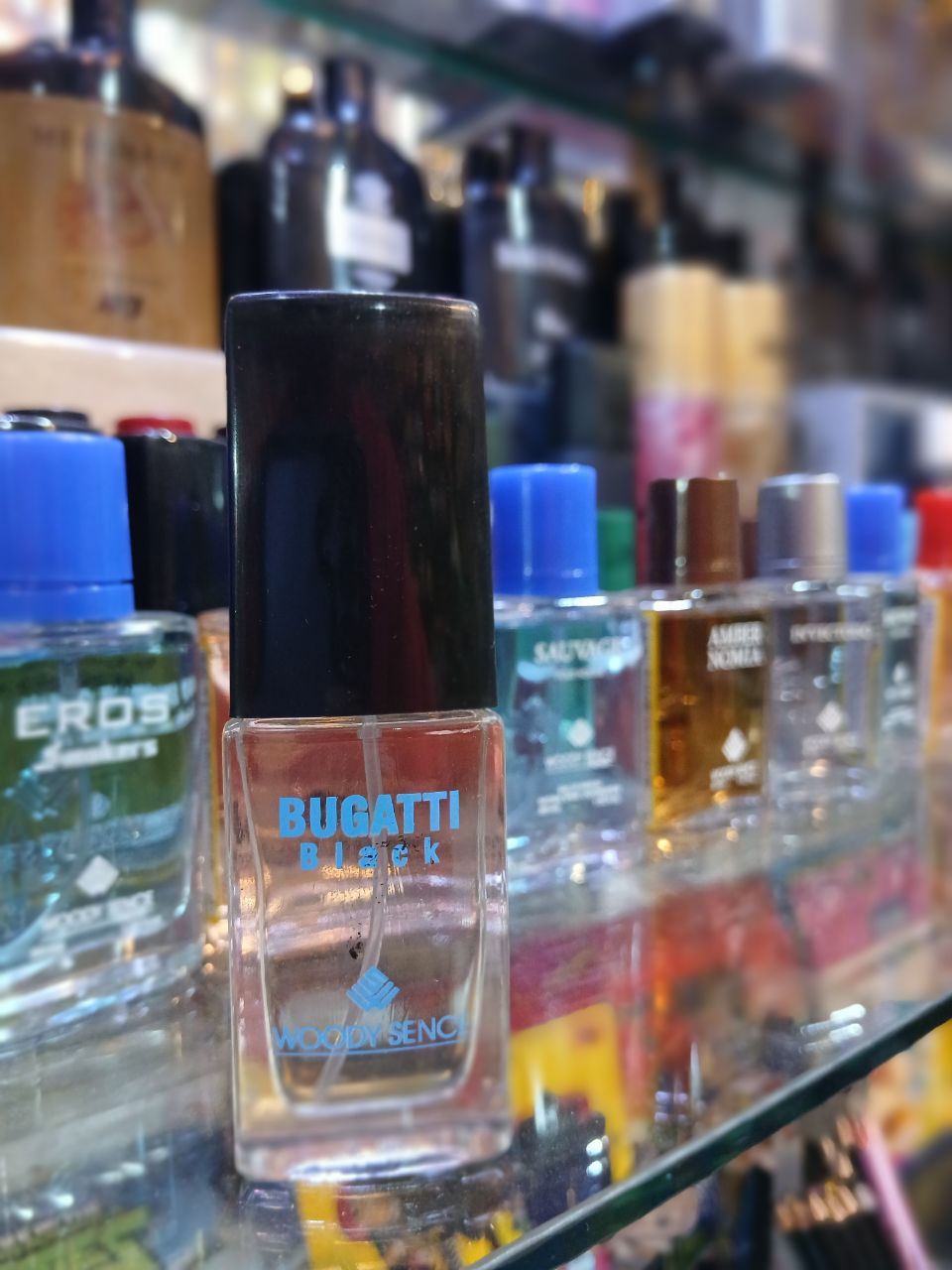 عطر جیبی مردانه وودی سنس مدل Bugatti Black